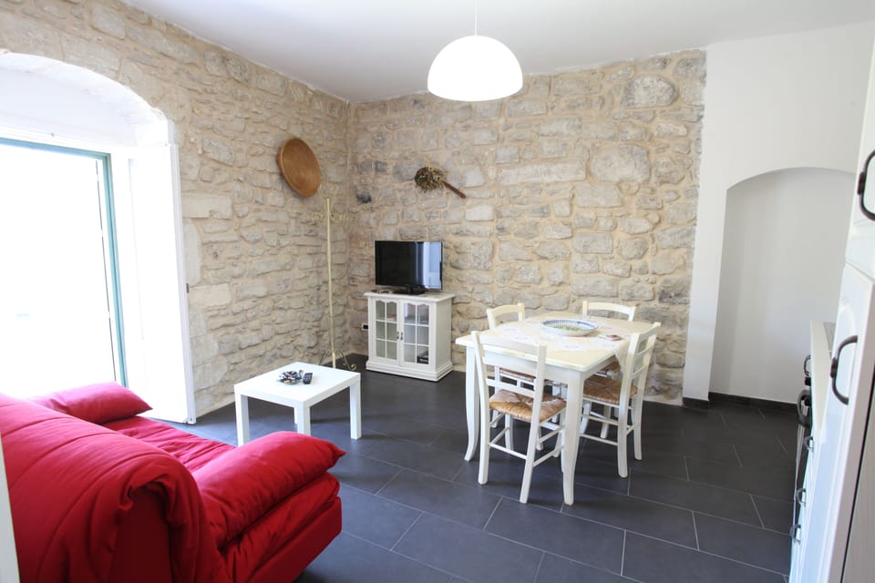 Family Apartment | Living area | Flat-screen TV