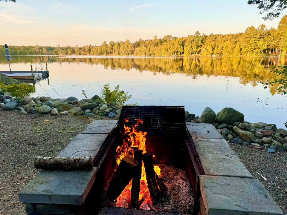 Large firepit with grill for cooking. Beautiful lake views. 