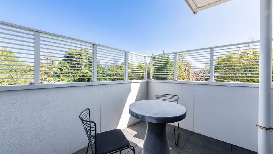 Private balcony escape perfect for morning coffee or sunset drinks.