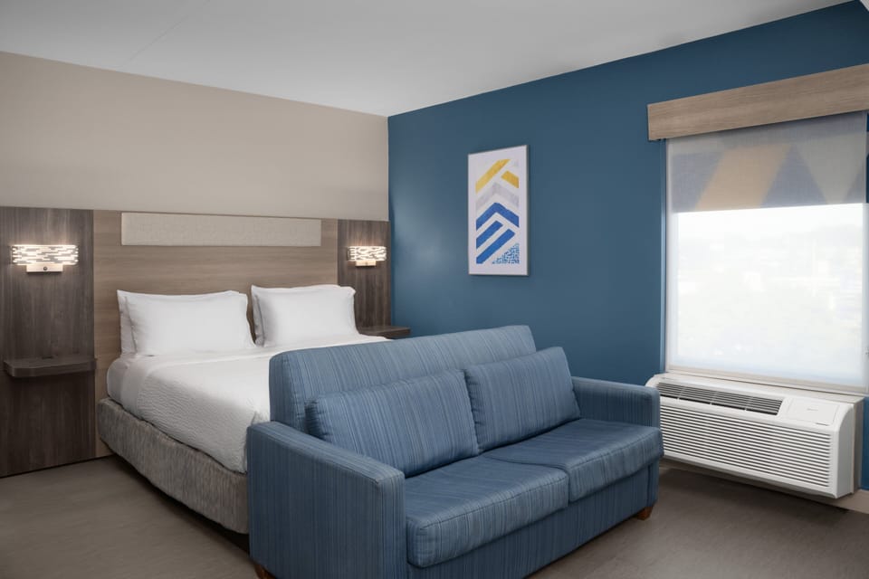 Standard Room, 1 King Bed (Extra Floor Space) | Desk, laptop workspace, blackout drapes, iron/ironing board