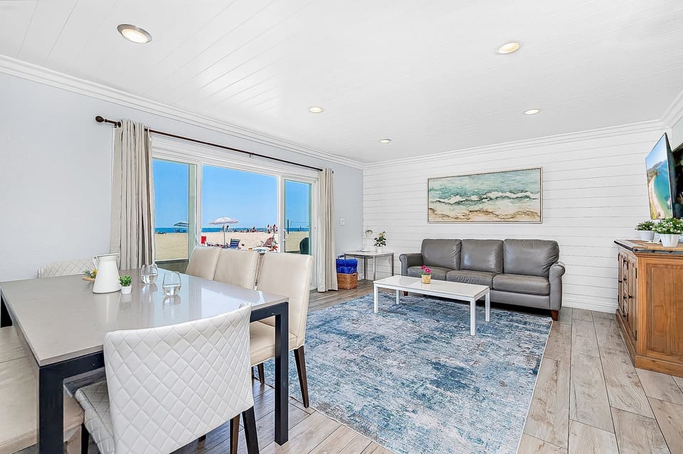 White wood “shiplap” covered walls, wide plank flooring, with custom tiling and lighting throughout - all complemented by airy, natural-toned furniture; the interior design will not disappoint.
                