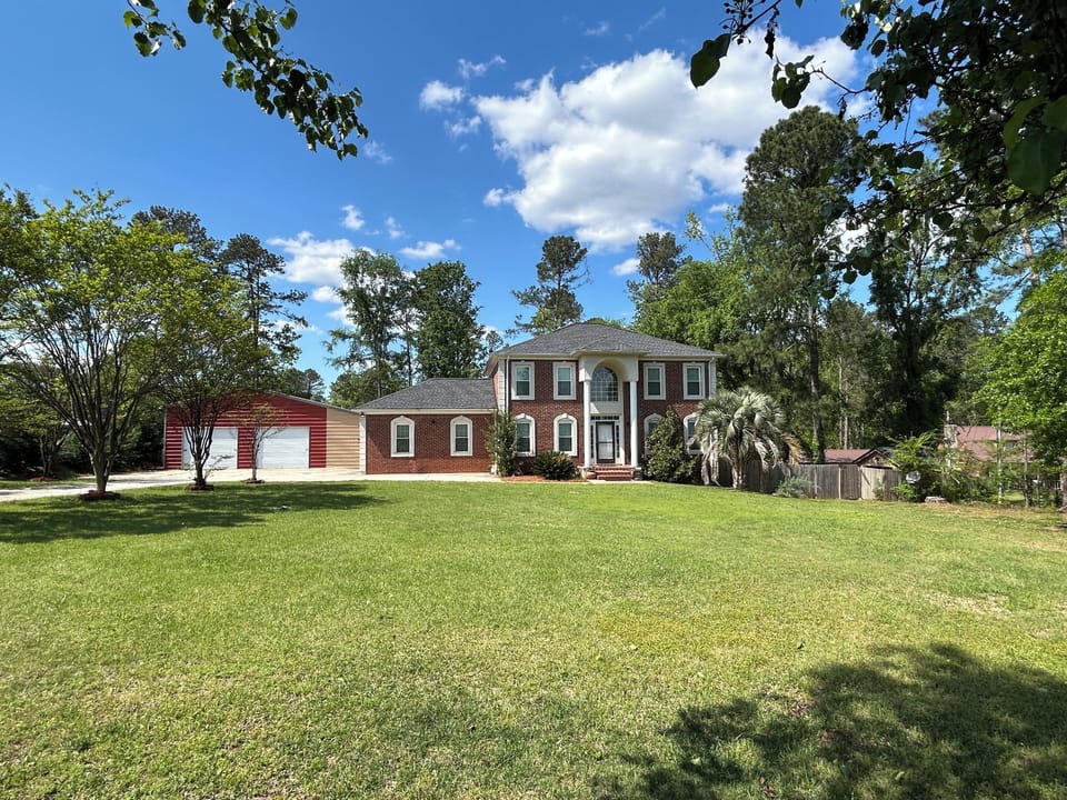2025 April - House from main road (post Hurricane Helene). 