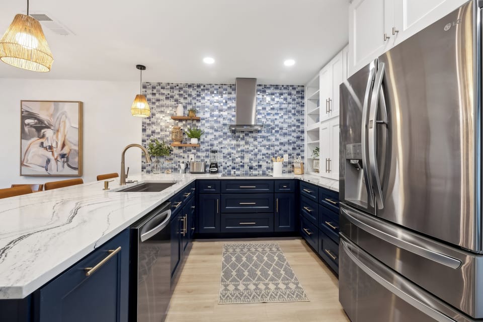 All electric stainless steel appliances including, Refrigerator, Oven, Stove, Microwave, Dishwasher, Toaster, Ice Machine, Wine Cooler, Toaster, Keurig Coffee Maker. Additionally, the kitchen counter top has 3 bar seats.