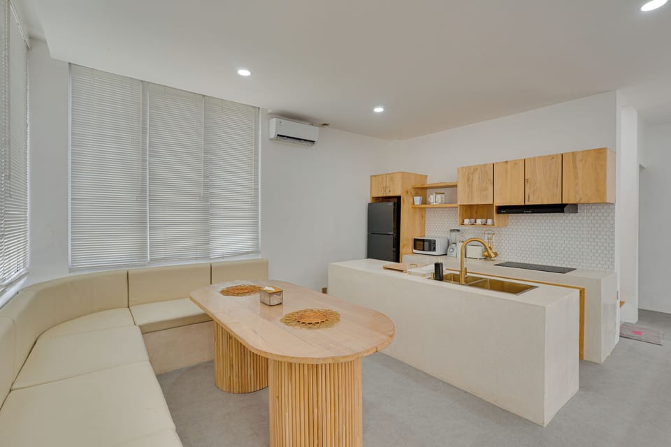 Villa, Balcony, Pool View | Private kitchen | Electric kettle, dining tables