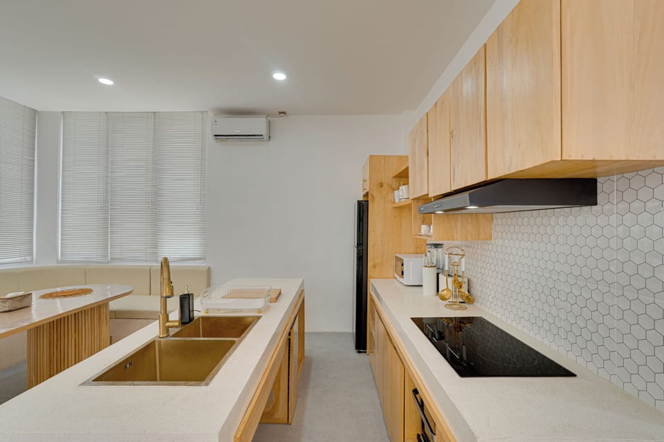 Villa, Balcony, Pool View | Private kitchen | Electric kettle, dining tables