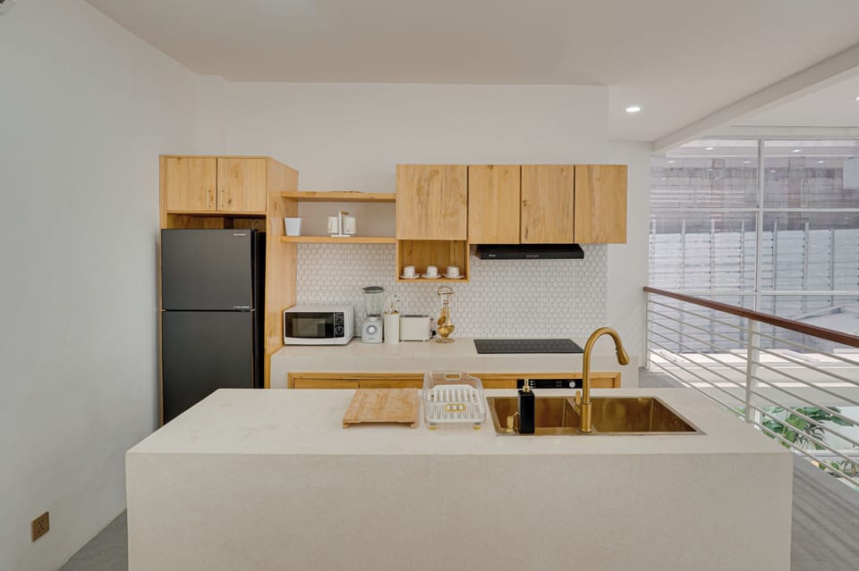 Villa, Balcony, Pool View | Private kitchen | Electric kettle, dining tables