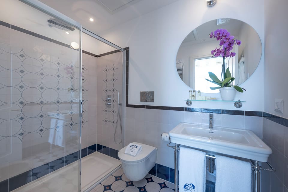 Double or Twin Room, Balcony | Bathroom | Shower, hair dryer, bathrobes, slippers