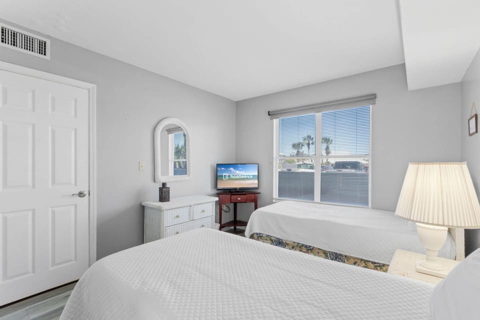 Signature Condo, 2 Bedrooms, Non Smoking, Beachfront | 2 bedrooms, iron/ironing board, WiFi (free), individually decorated