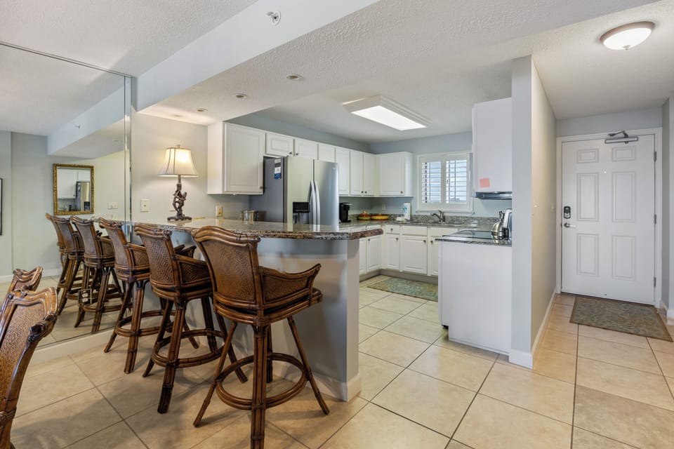 Sunrise At Sandy Key Unit 613 by PKRM - This sparkling modern kitchen is fully equipped. Just in case you want to cook on vacation. BUT you don't have to...