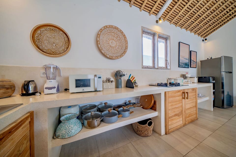 Deluxe Villa, Patio, Pool View | Private kitchen | Fridge, microwave, stovetop, electric kettle