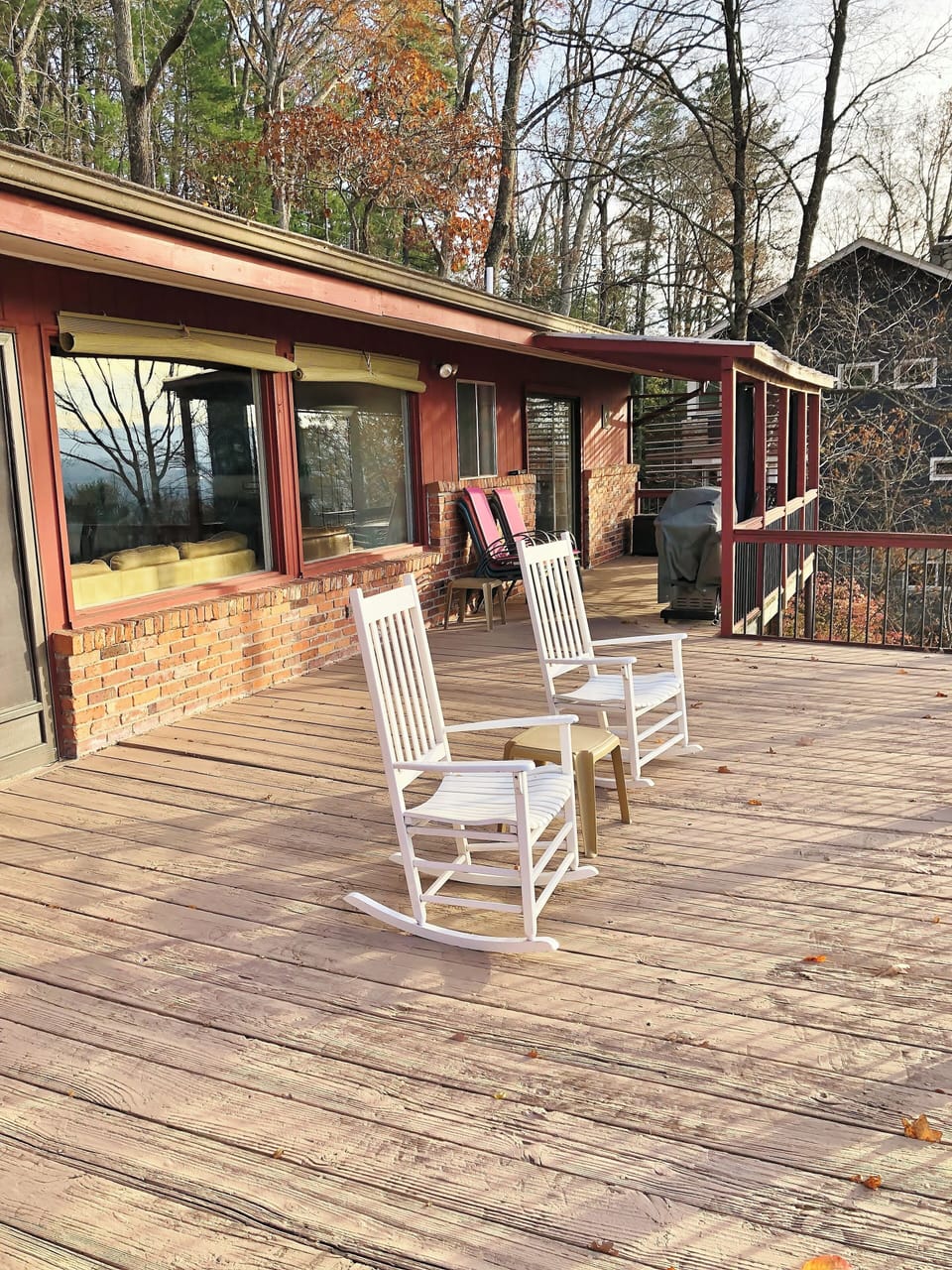 Large wooden deck with plenty of seating for all tranquil relaxation.