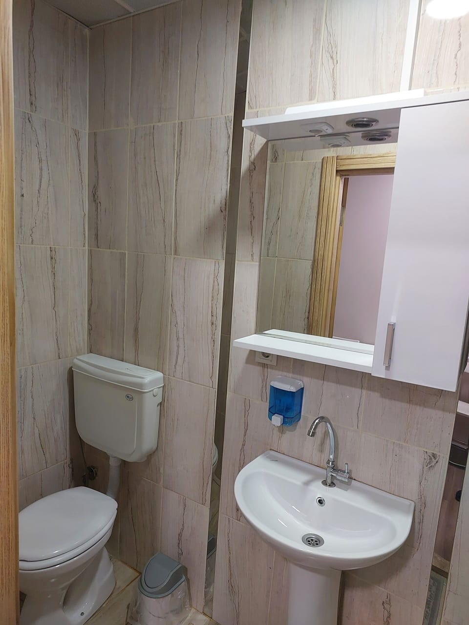 Shower, free toiletries, hair dryer, slippers