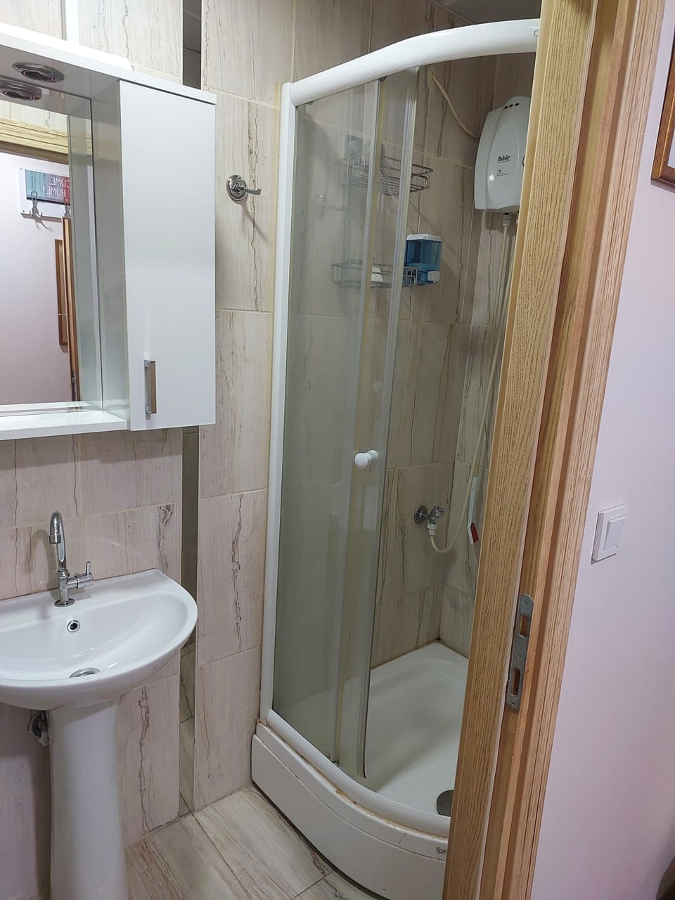 Shower, free toiletries, hair dryer, slippers