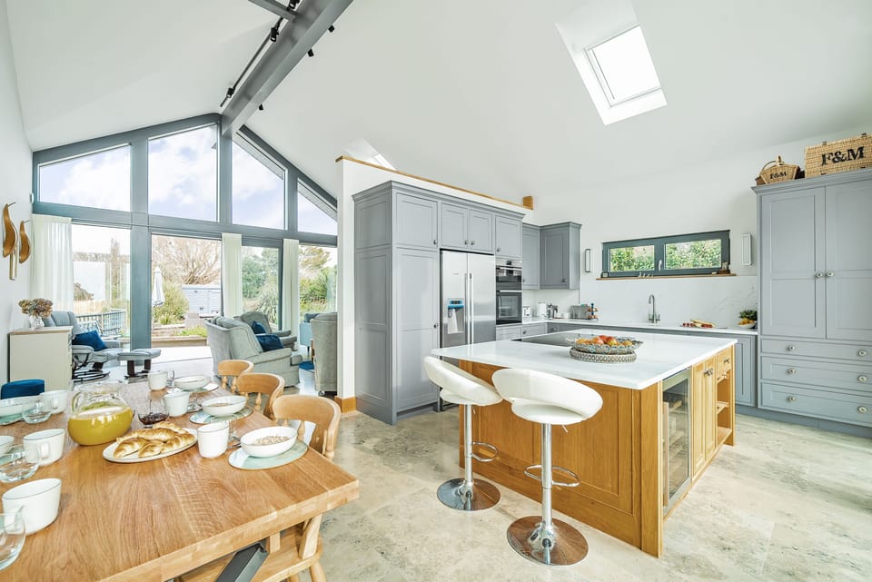 All Ways, Burton Bradstock: The kitchen island has an integral wine fridge