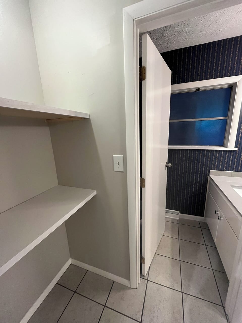 Hallway and half bathroom entrance