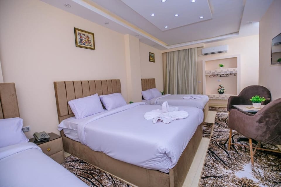 Luxury Quadruple Room, Balcony | Egyptian cotton sheets, premium bedding, down comforters, pillowtop beds