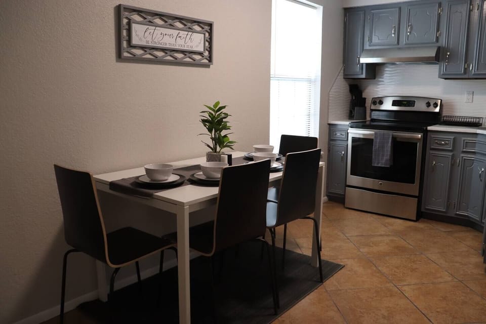 Dining table in a spacious kitchen. 