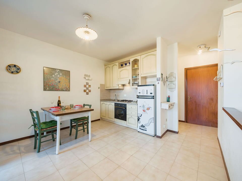 Interior Design, Flooring, Floor, Ceiling, Furniture, Room, Apartment, Cabinetry, Wood Flooring, Home Appliance