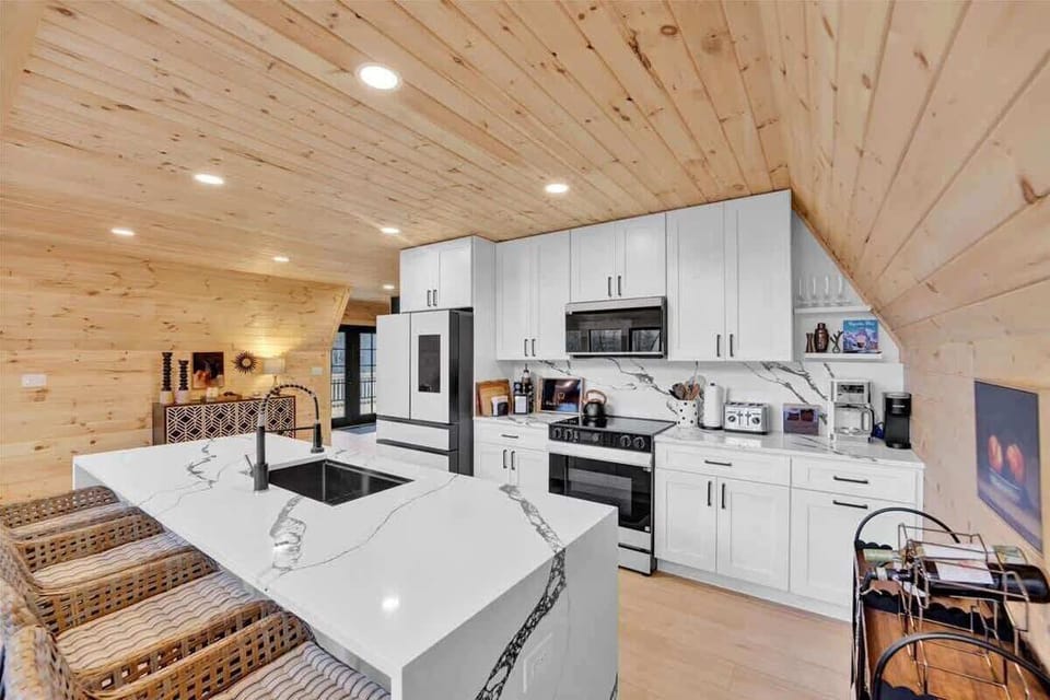 Fully equipped modern kitchen with large island and seating