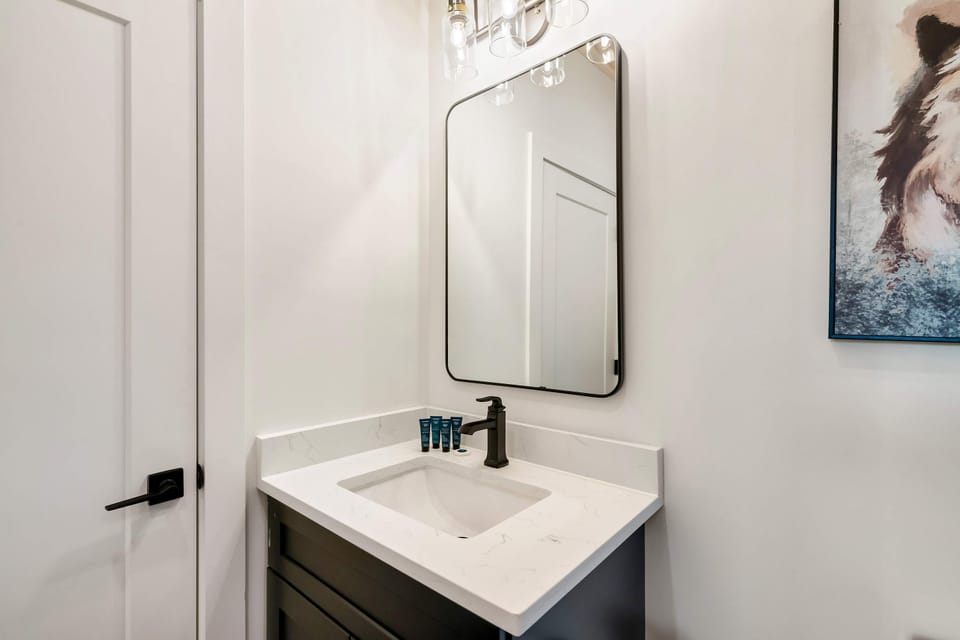 Sleek design with modern fixtures and stylish art for a refreshing retreat!