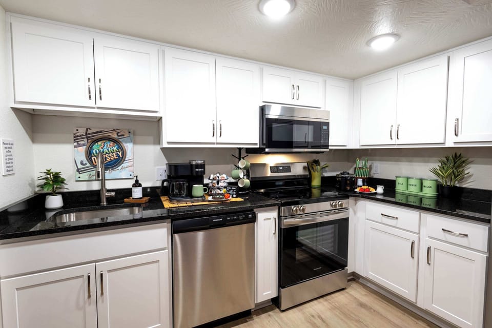 Ozark Odyssey has a modern, full-size kitchen with all brand new stainless appliances and everything you could need during your stay.