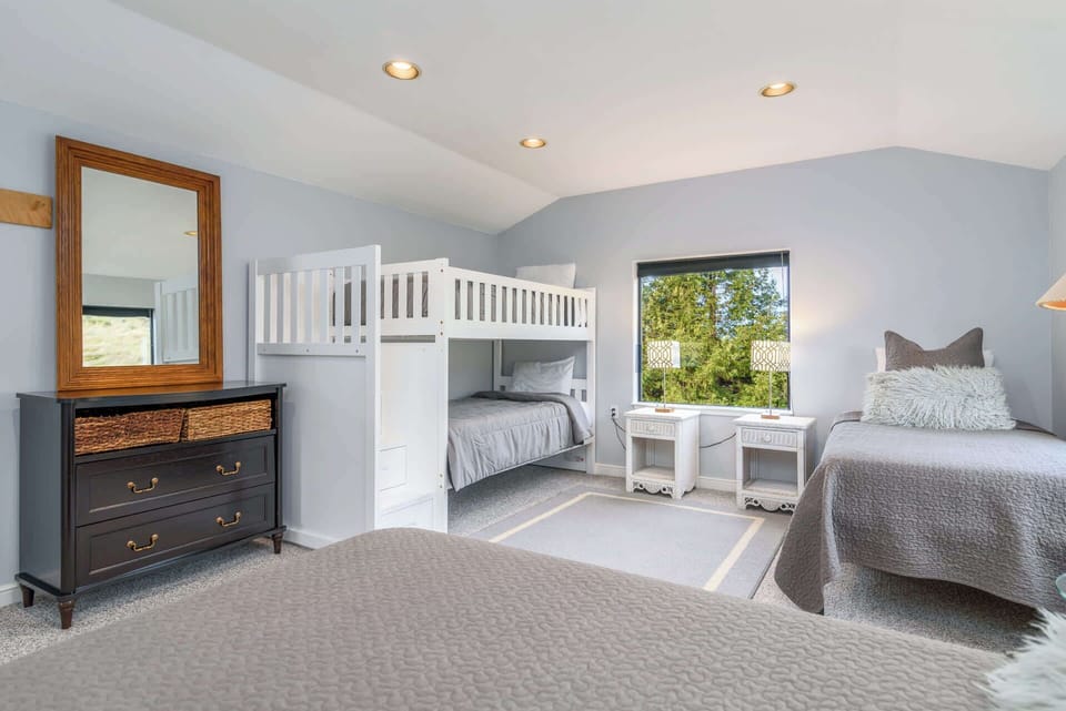 Bedroom 3 with twin/twin bunk bed, and 2 additional twin beds 