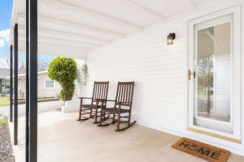 Sip morning coffee or an evening cocktail on the breezy front porch
