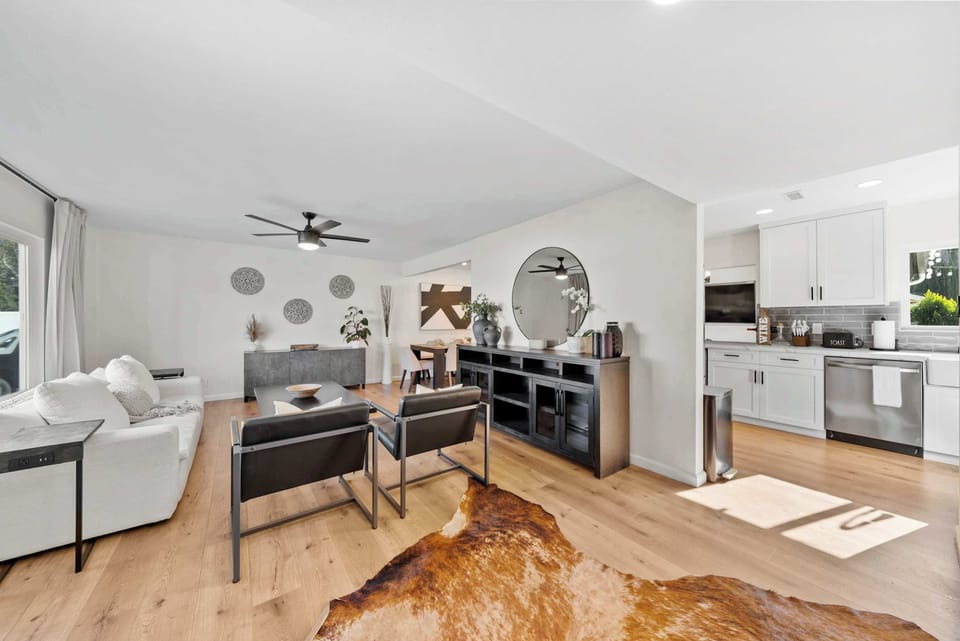 Sleek entertainment space with designer lighting