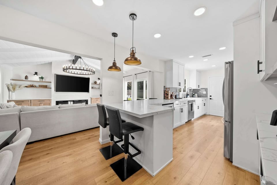 Modern kitchen with full appliances and storage