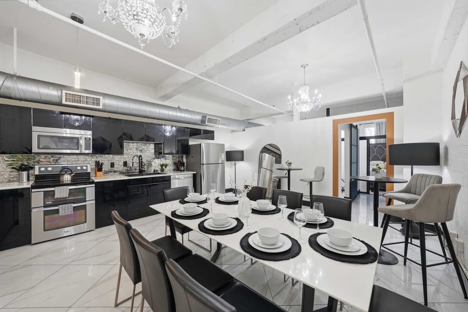 Spacious dining area set for group meals and gatherings.
