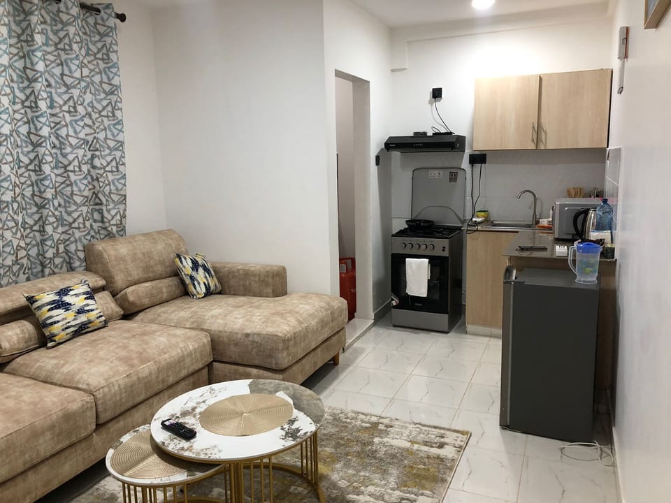 Superior Apartment, Balcony, Pool View | Living area | Flat-screen TV