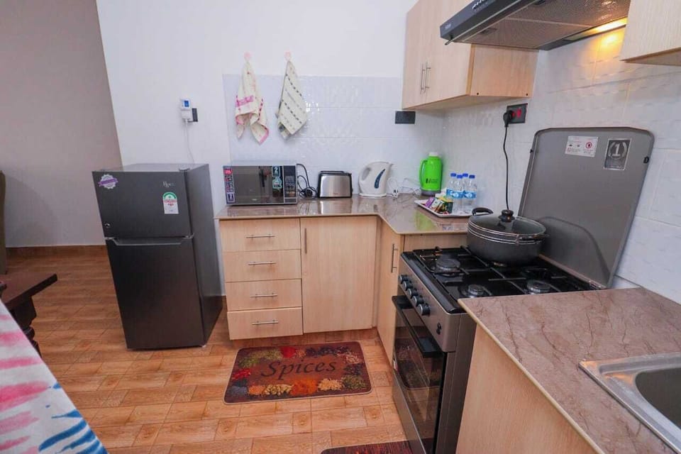 Family Apartment, Balcony, Garden View | Private kitchen