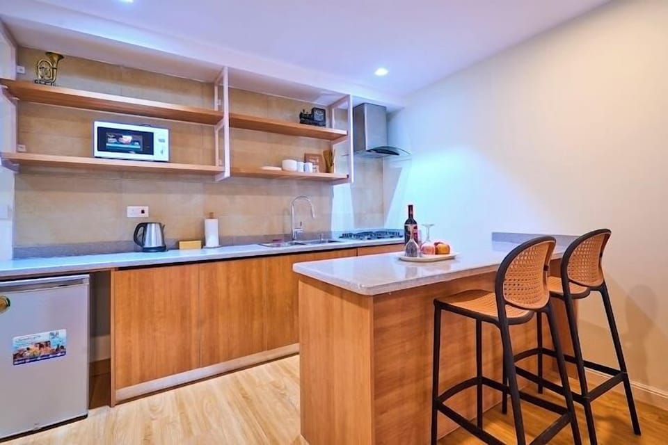 Junior Room, Balcony, City View | Private kitchenette | Fridge