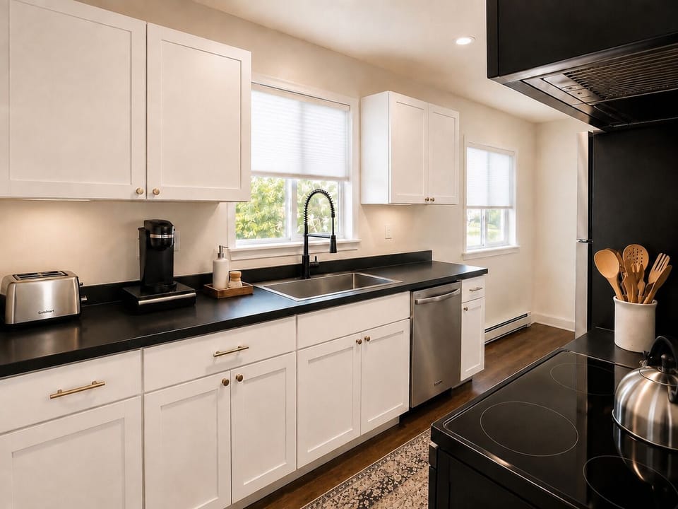 Bright, fully equipped kitchen with modern appliances and plenty of counter space