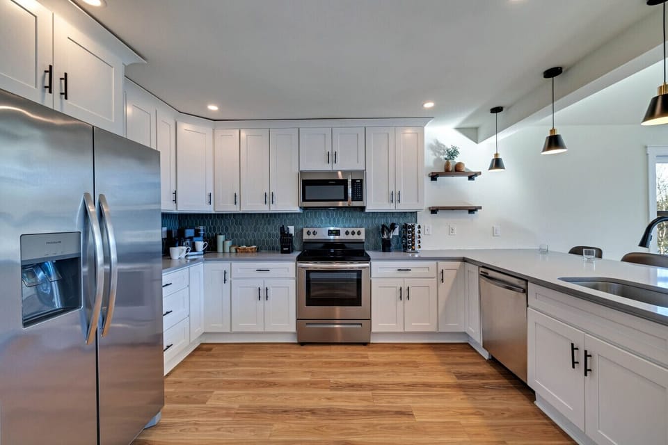 Fully equipped modern kitchen with sleek finishes, ample counter space, and all the essentials for a seamless cooking experience!