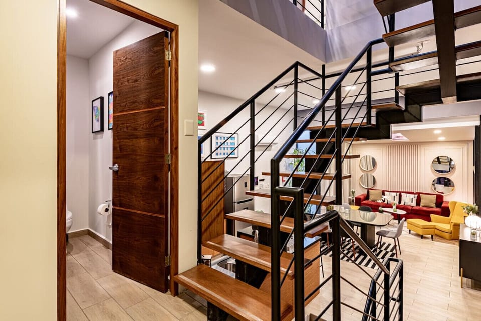 Stylish staircase leading to the next level of this spacious home