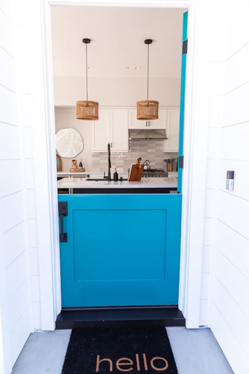 Front Entryway with Blue Door & Kitchen View