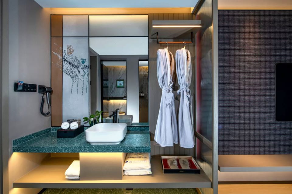 Business Double Room | Bathroom | Hair dryer, slippers, towels, soap
