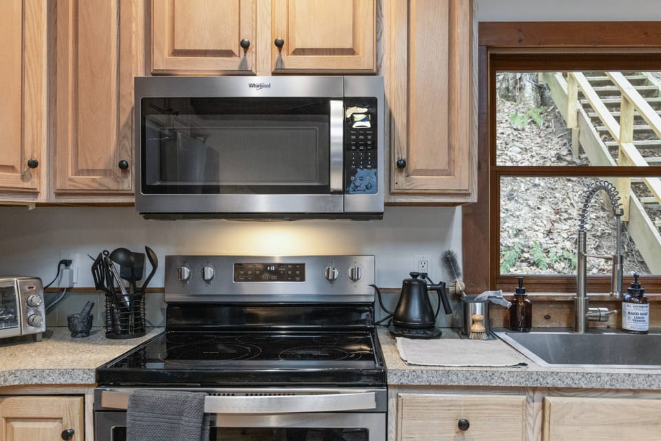 Modern appliance and fully stocked kitchen for all the conveniences
