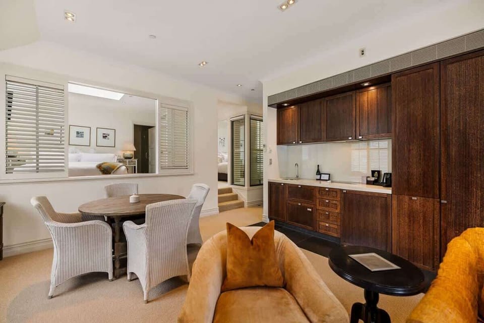 Fully Equipped for Culinary Adventures – This sleek kitchen features high-end appliances, Nespresso machine, and stylish finishes, perfect for preparing meals or enjoying a morning coffee before your Queenstown adventures.