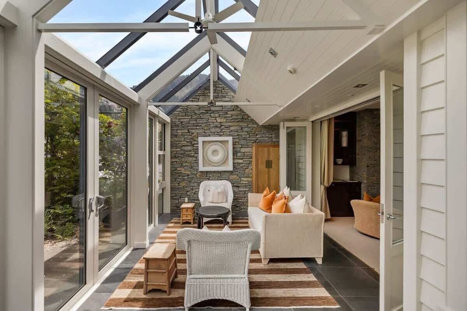 Soak in the Scenery – This beautiful conservatory provides uninterrupted views of Lake Wakatipu and the Remarkables, creating a peaceful and luxurious escape.