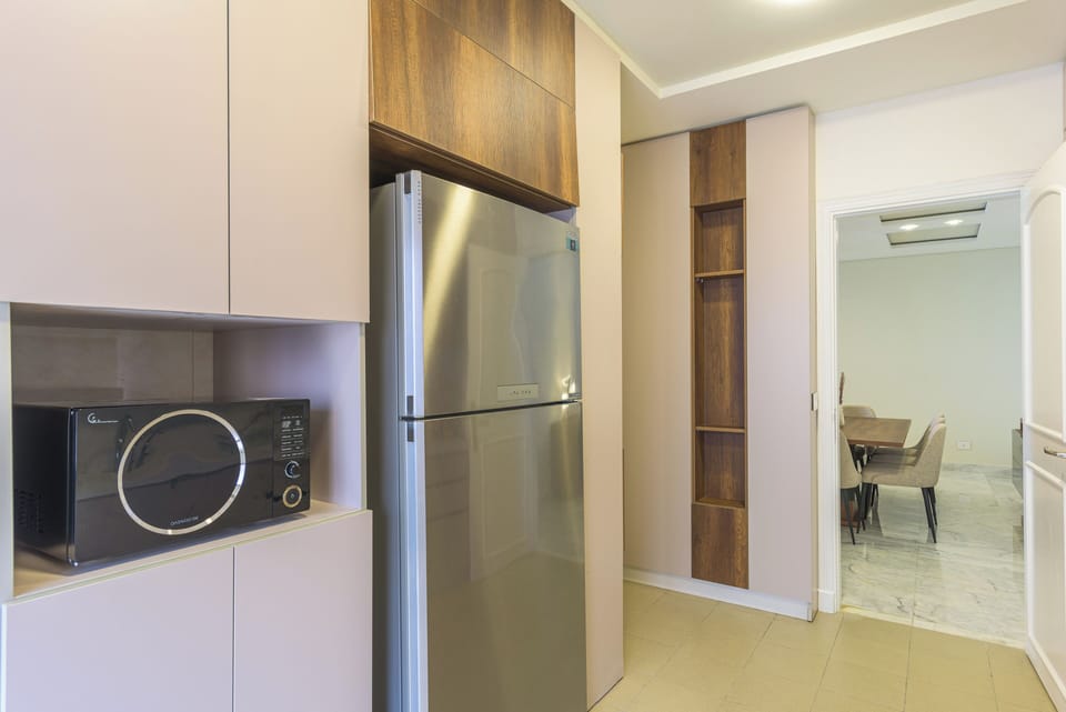 Apartment, 3 Bedrooms, Balcony, City View | Private kitchen | Full-size fridge, microwave, oven, stovetop
