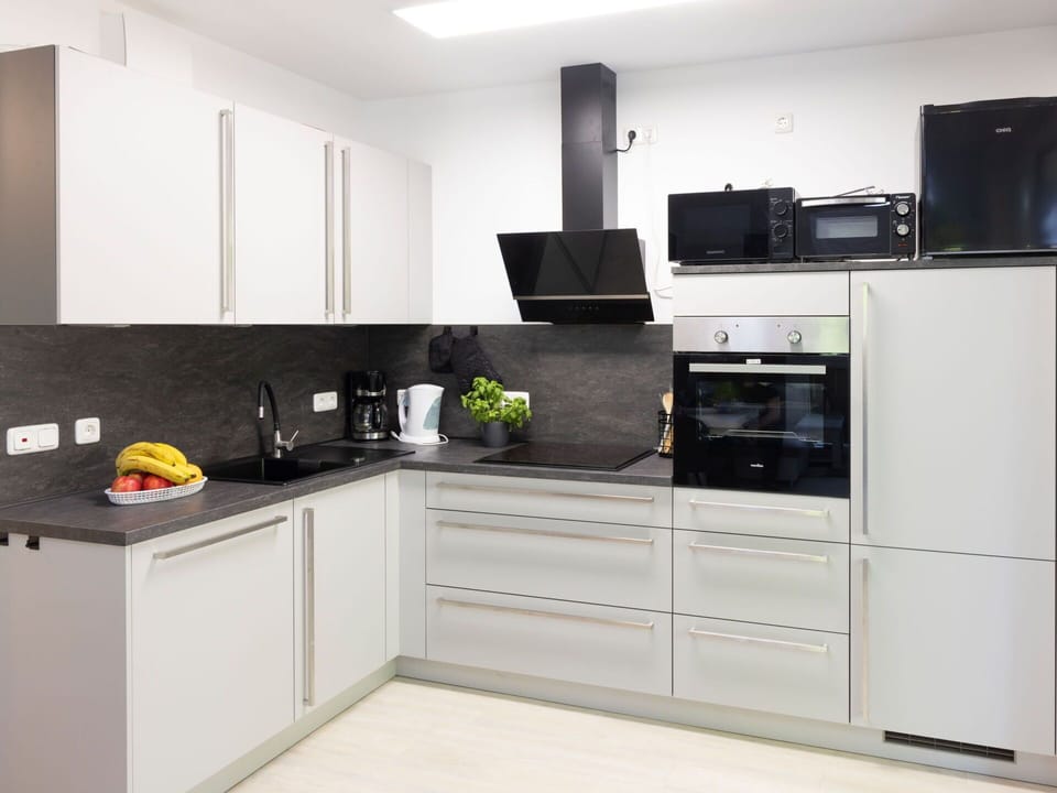 Kitchen, Kitchen Appliance, Countertop, Major Appliance, Flooring, Cabinetry, Wood, Furniture, Interior Design, Kitchen Stove