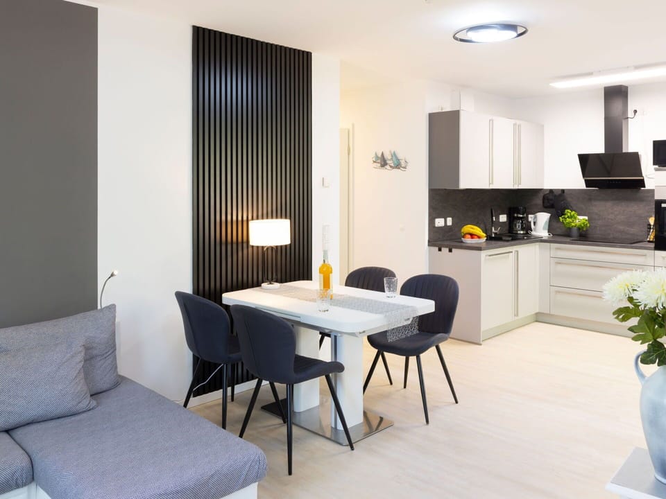 Furniture, Interior Design, Wall, Flooring, Wood, Floor, Table, Ceiling, Chair, Room