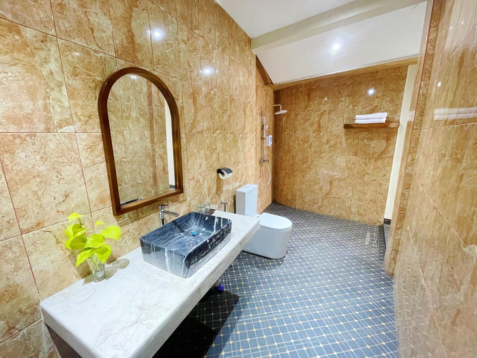 Shower, slippers, towels, soap