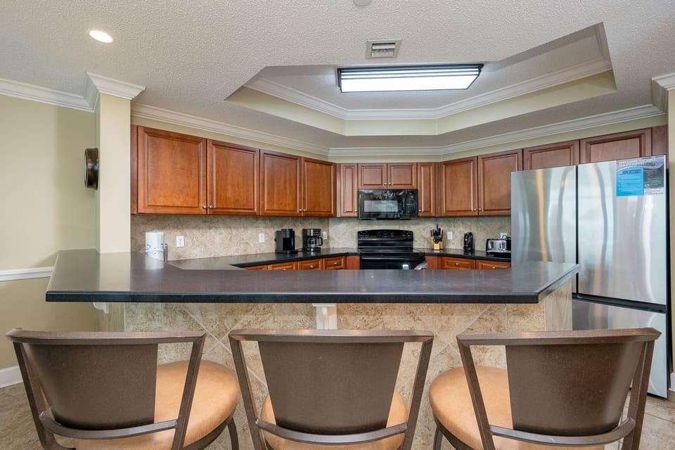 Condo, 3 Bedrooms | Private kitchen | Fridge, oven, coffee/tea maker