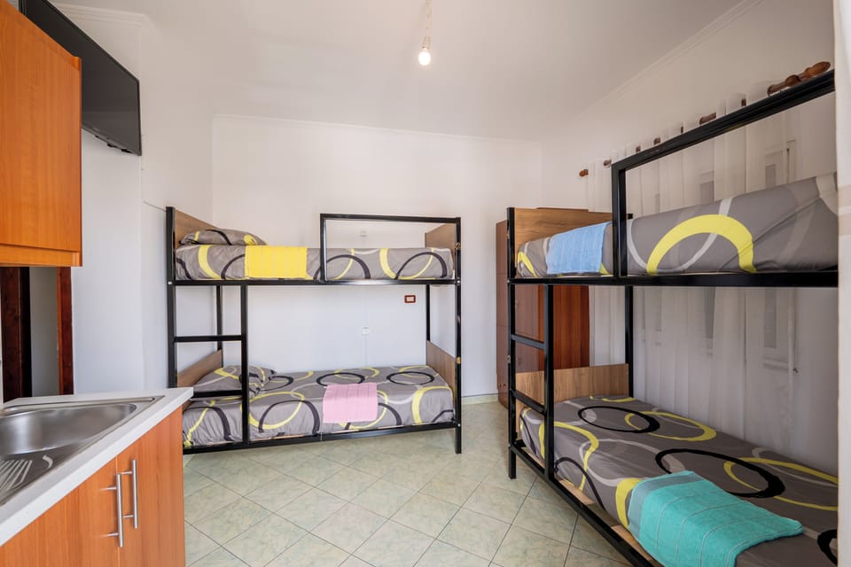 Bed in 7-Bed Dormitory Room | Free WiFi, bed sheets