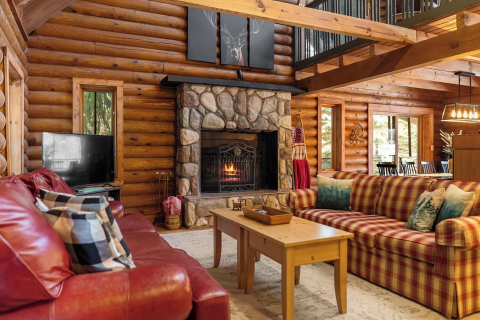Relax by the warmth of the wood-burning fireplace, surrounded by nature. 