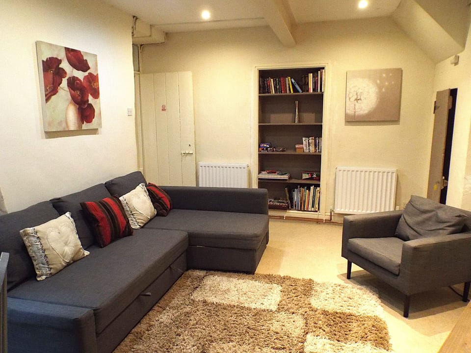 Living room with corner sofa turns into a Sofa bed