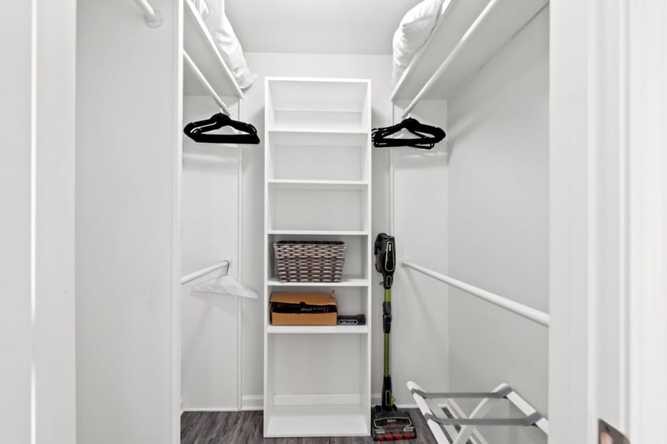 Your walk-in closet offers organized storage with shelving, hanging rods, and thoughtful touches to keep your belongings perfectly arranged.